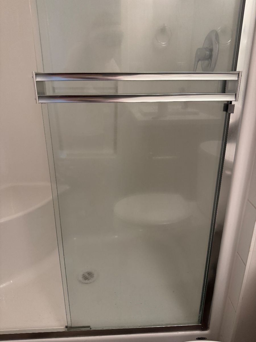 Glass shower door after cleaning